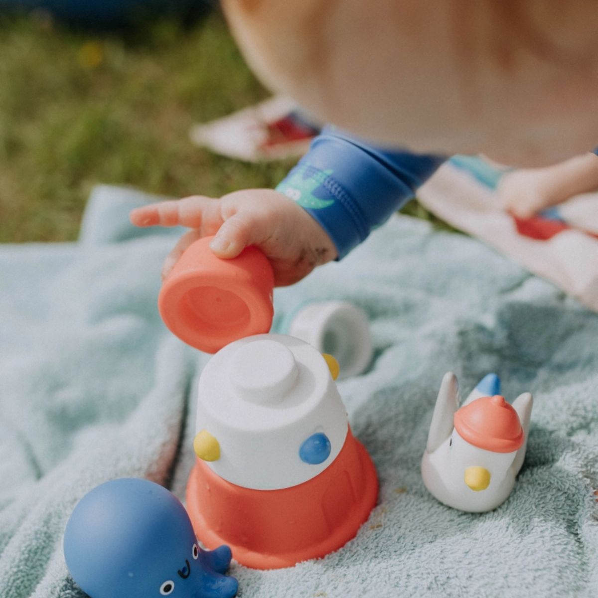 Itzy Ritzy Itzy Stack and Squirt Bath Toy - Easy and Safe for Little Hands