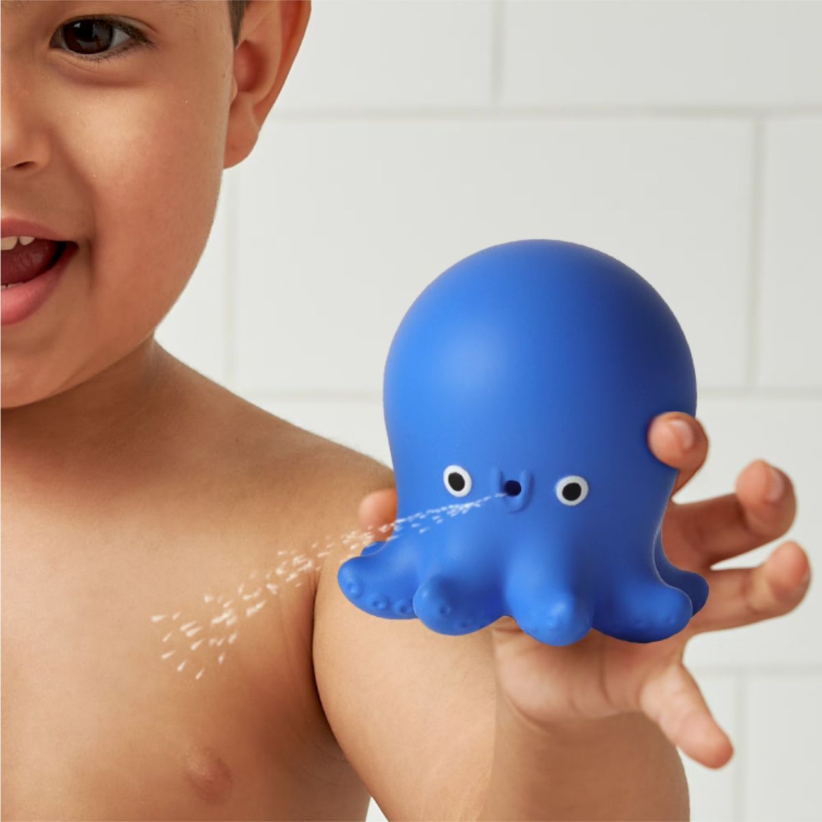 Itzy Ritzy Itzy Stack and Squirt Bath Toy - Supports Motor Skill Development